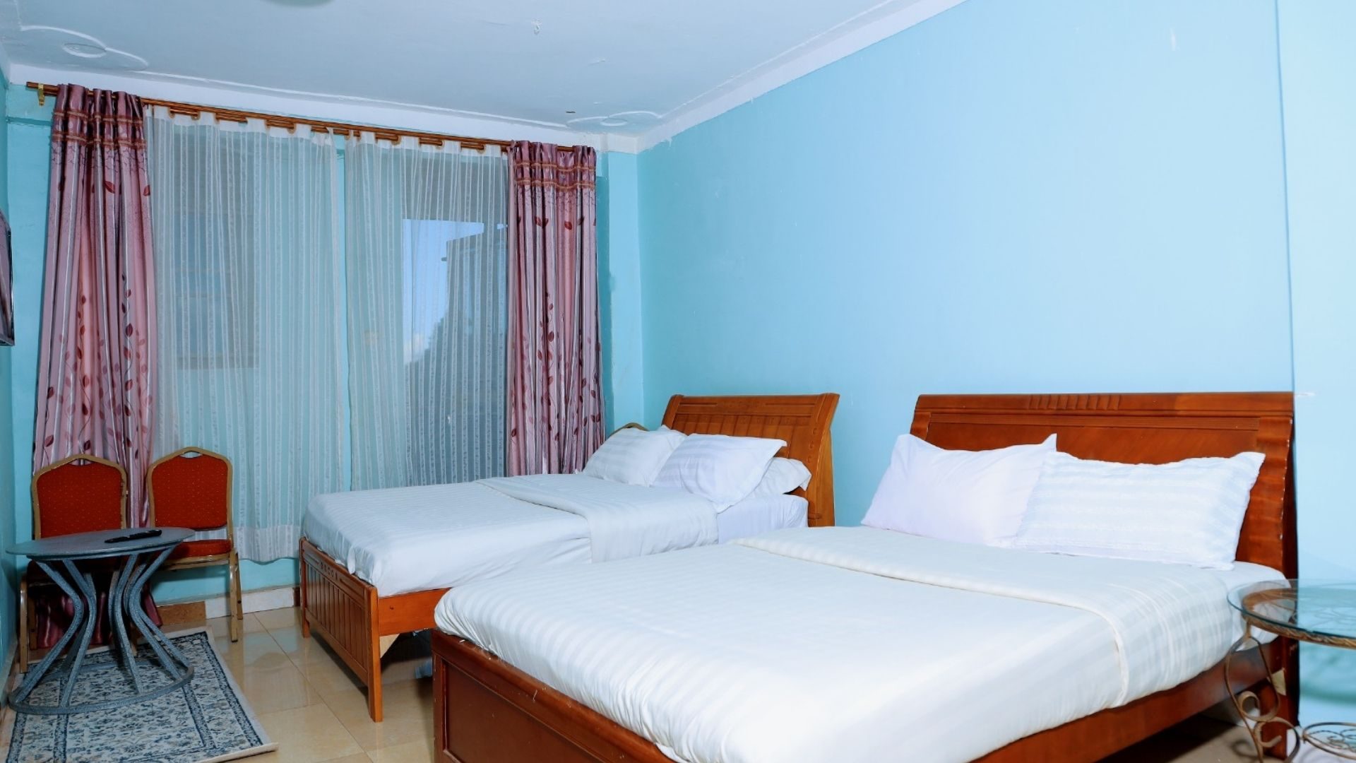Guest room at Buddiez Platinum Hotel, Nsambya, Kampala